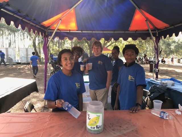 volunteers at lemonade stand