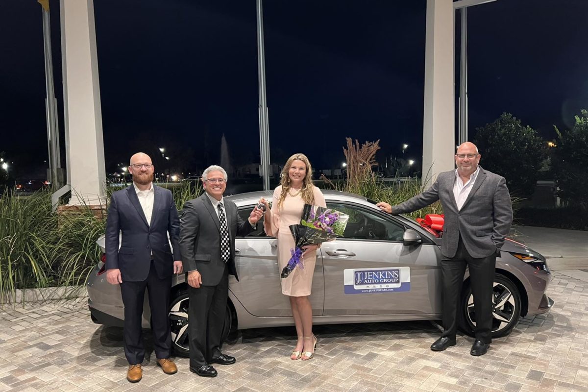 Jessica Noblin, the 2024 Lake County Schoools Teacher of the Year, pictured with Ian Sowards, Tom Formenak, and Jason Kirkland from Jenkins Auto Group